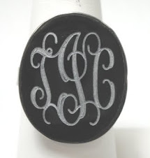 Engravable oval black shell ring $10 plus $5 for monogramming