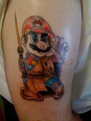 tattoo design of the day is one especially designed for all game lovers