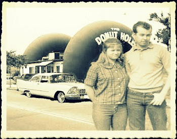 YOUNG COUPLE AT DONUT HOLE