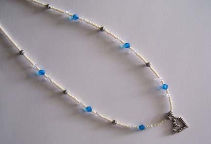 18" Light Blue & Clear Heart Pendant Necklace $35.00