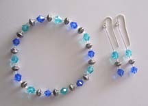 8" Light & Dark Blue Swarovski Crystals Bracelet $25.00 Earrings $20.00