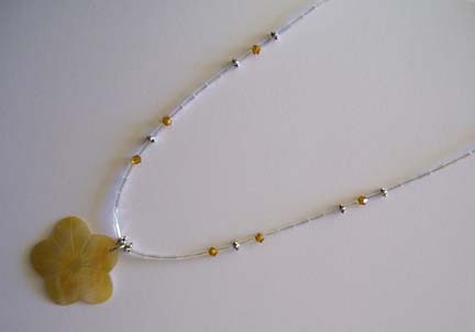 18" Etched Yellow Shell Flower Pendant Necklace $35.00