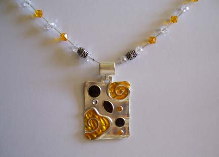 Yellow & Black Enameled Pendant Necklace (close-up)