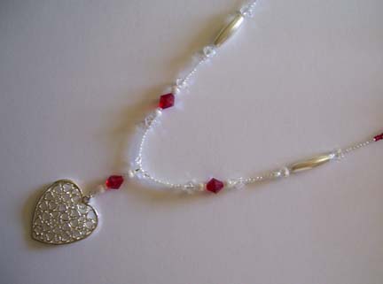 20" Silver Heart & Red Glass Pendant Necklace $40.00