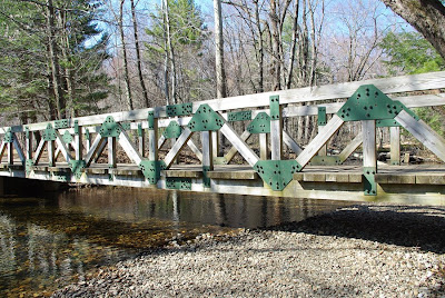 Wooden bridge crossing Mill River in Amherst, MA