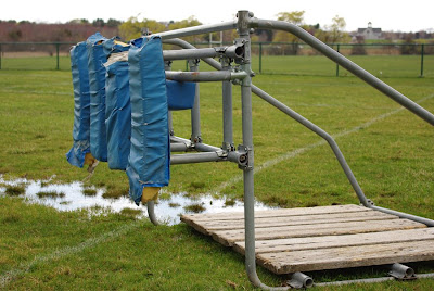 Football training sled in UMass McGuirk Stadium field