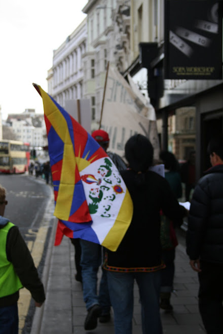 Tibetan section chanting Om Mani Pedme Hung.