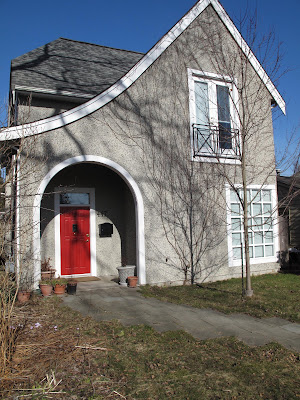 Grey House With A Red Door