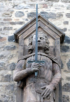 Statue holding a sword