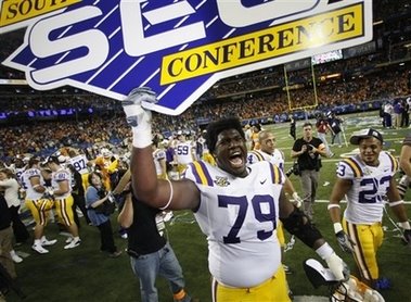[LSU+holding+SEC+Champ+sign.jpg]