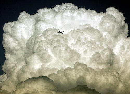[plane+over+cloud.jpg]