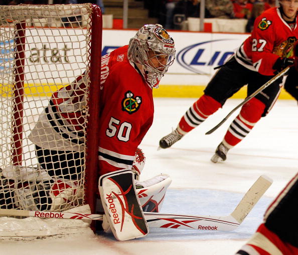 Corey Crawford's baby was rocking adorably small goalie pads at a