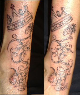 crown c evilution tattoos