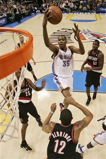 kevin durant dunking on. Kevin Durant on the cover of