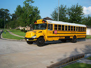 Austin catches the school bus right across from the house! Bus is here!