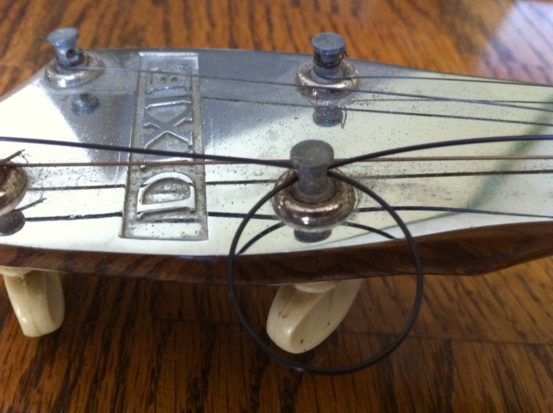 Dixie Banjolele How Does One Set Up A Bridge? How Does One Replace