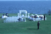 Rehoboth beach wedding with our crystal fabric canopy. (beach wedding decor)