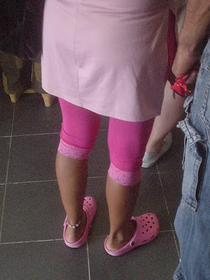 pink crocs on feet
