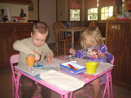 painting with his sister