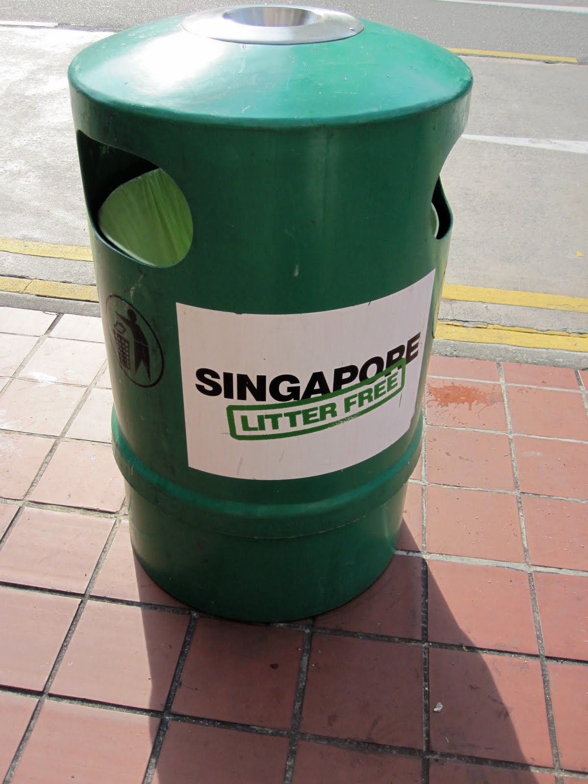 The world through a trash receptacle Singapore by Tania