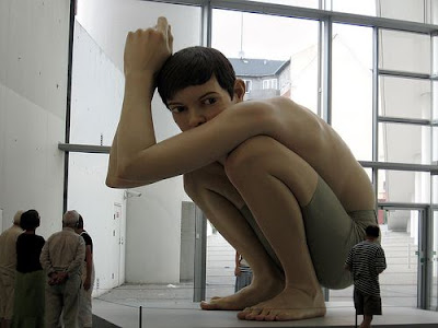 Sculptures Of Boy Sitting 