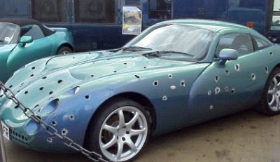 090414-car-bullet-holes.jpg