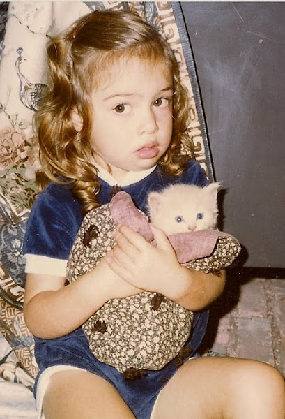 It doesn't get much cuter than this - Ruth Ida Rose with a forever remembered baby kitty...