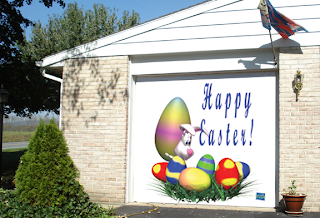 Happy Easter 2009 a Funny bunny saying and writing on wall of the house with colorful(colored) eggs hot hq(hd) wallpaper