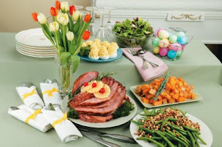 Easter traditional Dinner with colorful eggs, flowers, spoons, cakes, and bread slices on Easter dinner table sexy pic