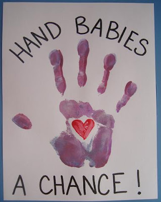 Handprint sign, "Hand babies a chance!"