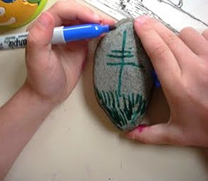 Rock being colored by marker