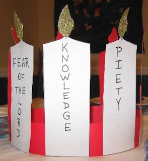 Paper crown with candle cutouts