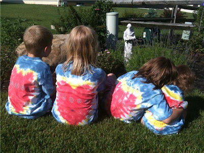 Back of tie-dyed shirts on children