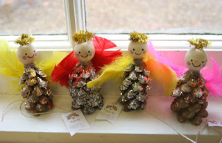 Angel dolls made of pinecones