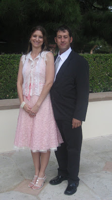 My Hubby and I at a friends wedding renewal 2009