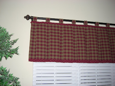 Pleated curtains with tabs