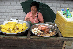 lady selling corn on cob