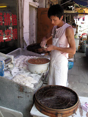boy making pork filled dumplings