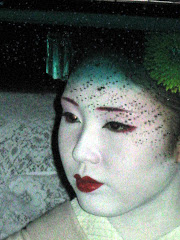 Geisha Waiting in Taxi