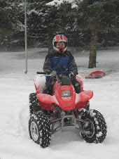 Ridin' my fourwheeler in the SNOW!