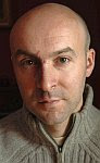 A color photo of Christopher Brookmyre by Charlie Hopkinson.