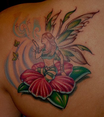 fairy tattoo and hibiscus tattoo. fairy tattoo and hibiscus tattoo