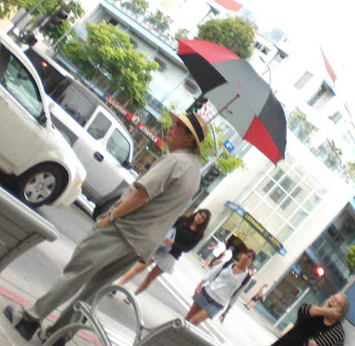 An Umbrella and A Hat is like A Belt and Suspenders
