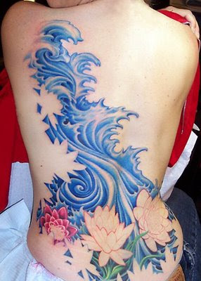 flower on the back,Tattoo flower in woman