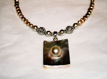 Mabe pearl in sterling pendant with freshwater pearls and Bali silver