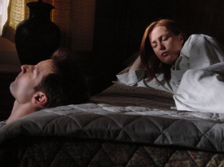 [JS.DavidGillianeyesclosedonbed.JPG]