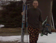 K in his get-up gettin my snowboard his skis!!