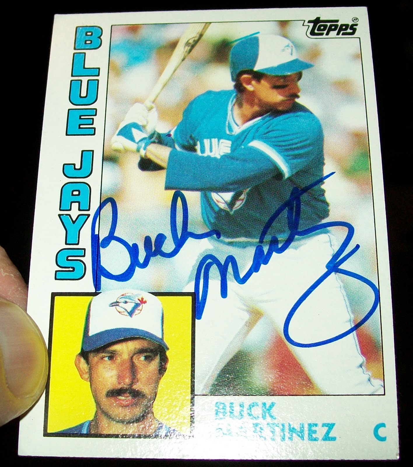 Chewing liquorice Buck Martinez autographed cards.