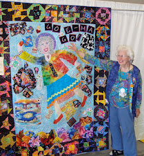 Jean Spencer shows off her darling story quilt