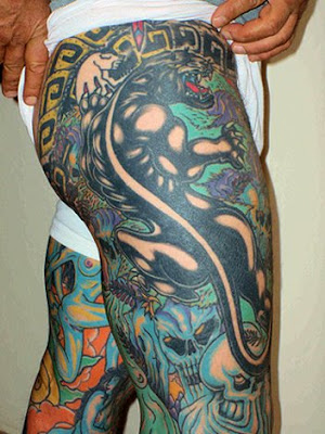 Old skool panther tattoo on the back and shoulder